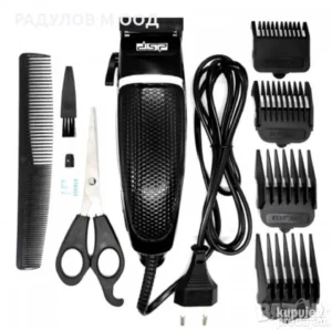 DSP F-90063 mašinica za šišanje sa nerđajućim sečivom, ergonomskim telom i setom nastavaka, prikazana u fabričkom pakovanju.