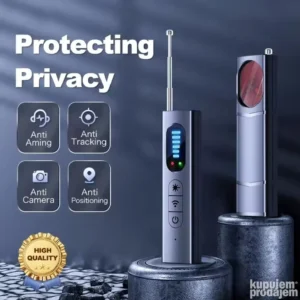 Detektor prisluškivača i skrivenih kamera sa LED indikatorima i antenom, uz prateći kabl i opremu, postavljen na stolu spreman za upotrebu.